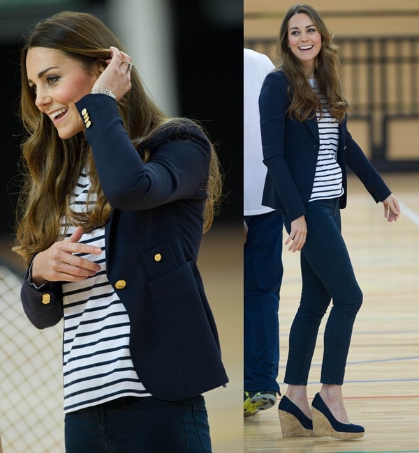 Kate Middleton playing volleyball at a SportsAid athlete workshop at the Copper Box in the Queen Elizabeth Olympic Park in London on October 18, 2013