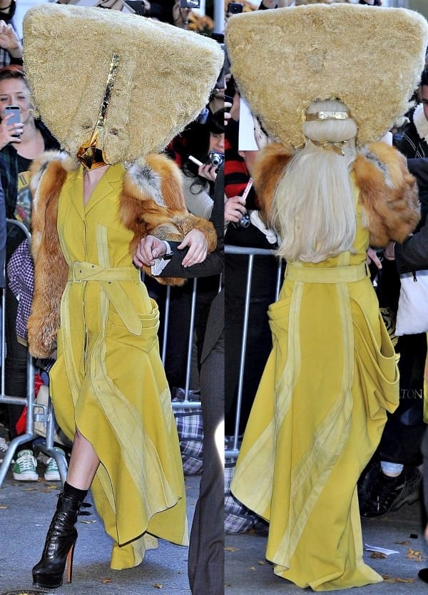 Lady Gaga leaves the Ritz Carlton Hotel in Berlin, sporting a striking couture face mask paired with a chic John Galliano coat on October 24, 2013