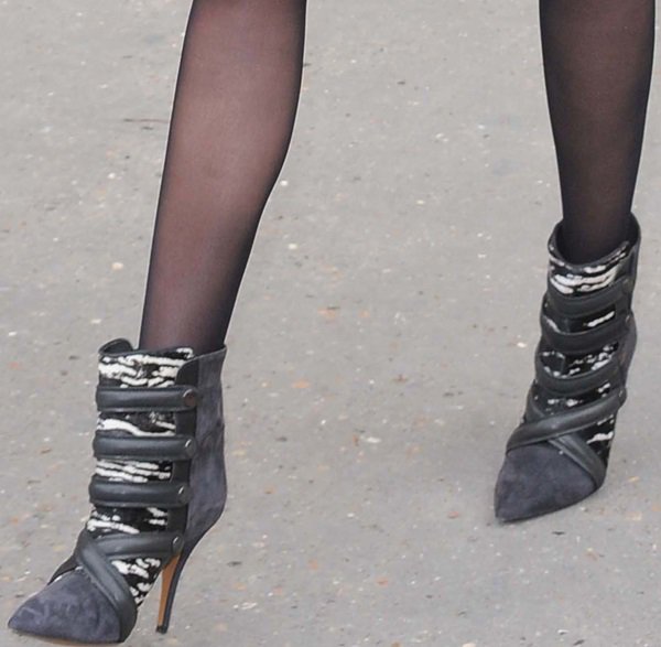 Miranda Kerr wearing her version of the 'Tacy' boots