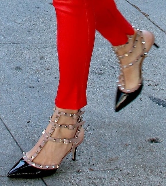 Rebecca Romijn Valentino Rockstud Pumps Rebecca Romijn shopping in Beverly Hills wearing red leather skinnies and Valentino Rockstud Pumps