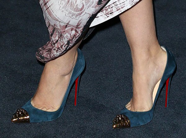The pointed-toe Louboutins add structure and a touch of edge to her otherwise relaxed, artistic ensemble