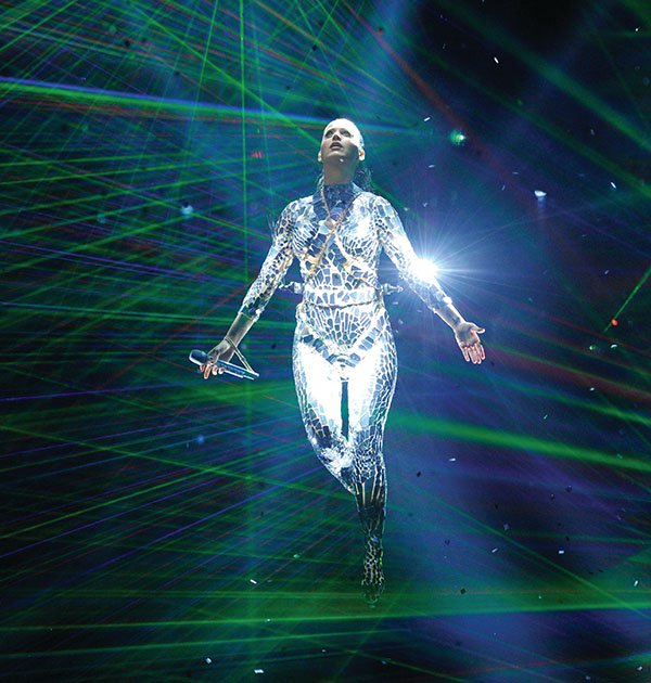 Katy Perry commanded the stage, suspended amidst a spectacular light show and a flurry of dancers, creating an unforgettable visual spectacle