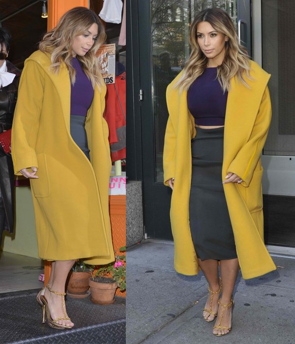 Kim Kardashian was spotted leaving Kanye's apartment in NYC on November 20, 2013, wearing Tom Ford Spring 2012 sandals, a Lanvin side gather zip skirt, a Maxmara Teddy yellow coat, and a Marni dark purple blouse