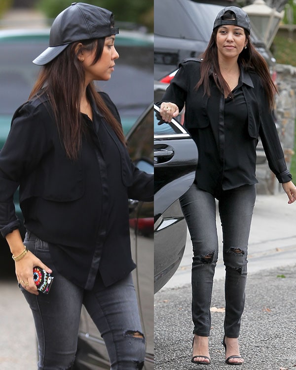 Elevate a laid-back, tomboy-chic look like Kourtney Kardashian by pairing a black button-up shirt and ripped skinny jeans with a backward cap and sleek Alexander Wang heels for a stylish contrast