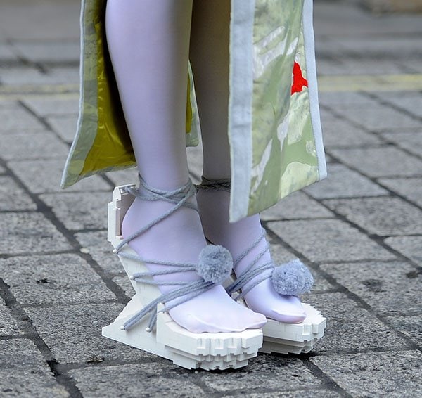 Lady Gaga in platform sandals by Winde Rienstra featuring straps with pompoms
