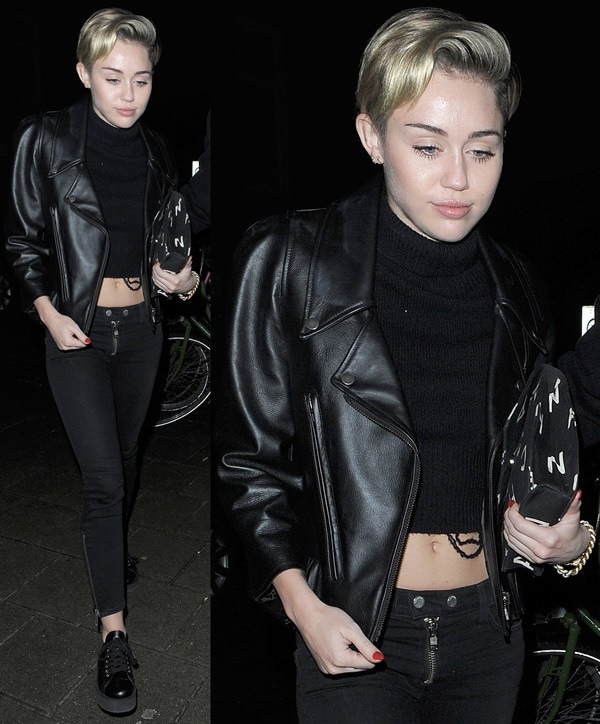 Miley Cyrus stepped out in Amsterdam on November 8, 2013, wearing a Stella McCartney cropped turtleneck sweater, Textile Elizabeth and James skinny jeans, a Maison Martin Margiela leather jacket, Comme Des Garçons platform shoes, a Chanel vintage printed jersey bag, and a Delfina Delettrez red mouth and pearl single earring
