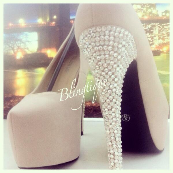 Blingtique’s ivory platform heels showcase the brand’s signature hand-applied pearl and crystal stiletto, turning a classic nude silhouette into a full-glam statement