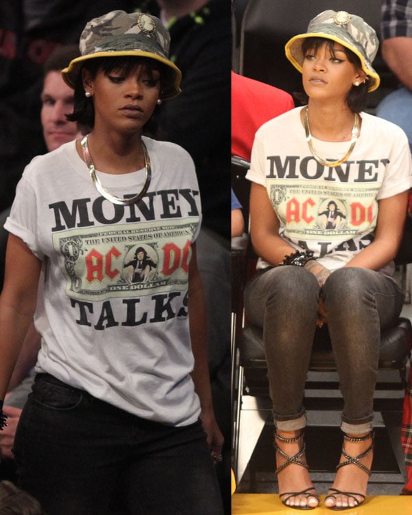 Rihanna wears a bucket hat, jeans and an AC/DC t-shirt for a courtside appearance at a Lakers game