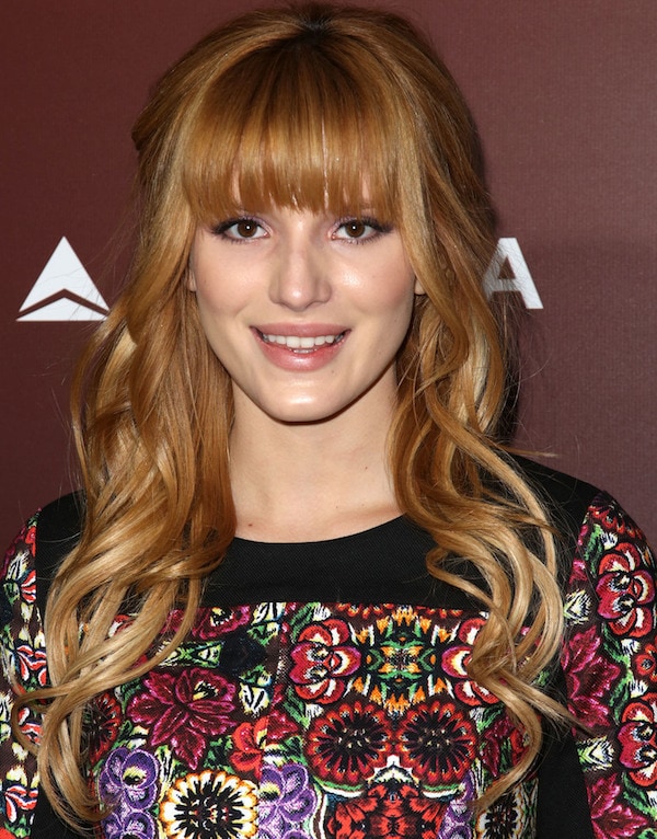 Bella Thorne's golden locks fell in soft waves on her shoulders