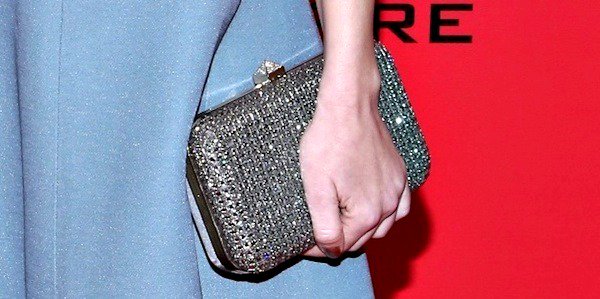 Jena Malone toting a silver clutch from Valentino