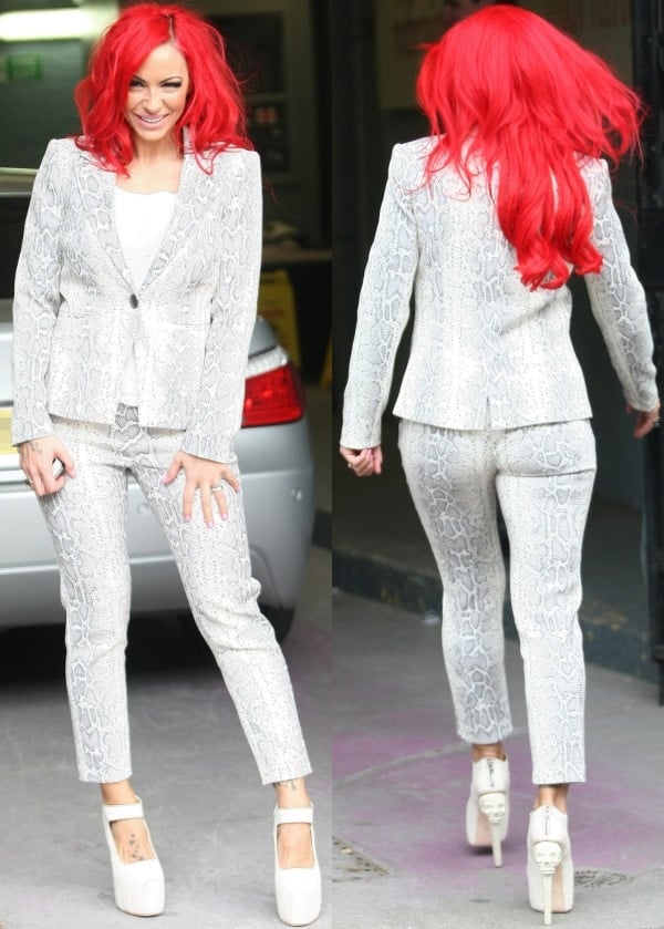 Jodie Marsh stepped out in a bold snakeskin-print suit, pairing the tailored ensemble with striking platform pumps that featured skull-shaped heels