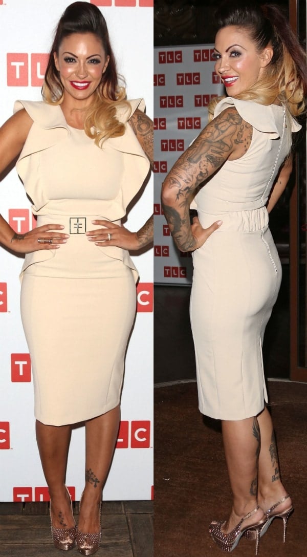 Jodie Marsh, radiating confidence at the launch of her new TLC television shows at the Sanctum Soho Hotel in London on October 9, 2013, flawlessly pairs her elegant cream dress with sparkling, crystal-embellished pumps