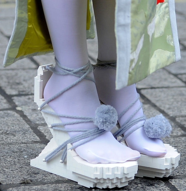 Lady Gaga wearing white lego heels from Winde Rienstra