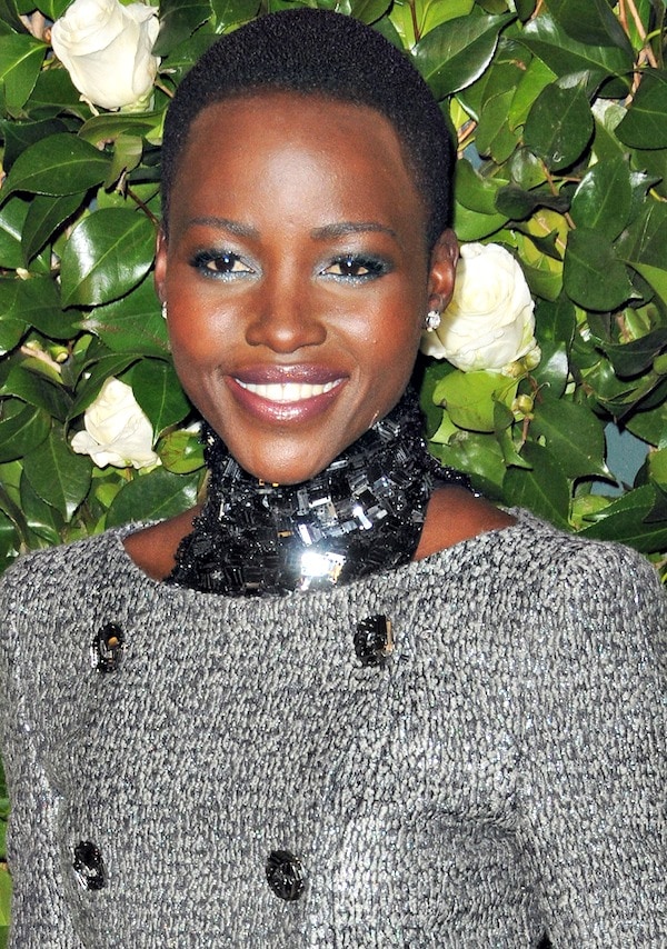 Lupita Nyong'o in a tweed double-breasted jacket