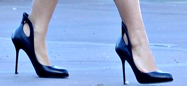 Salma Hayek's striking pair of Sergio Rossi's black 'Oblo' pumps feature unique circular cutouts at the back