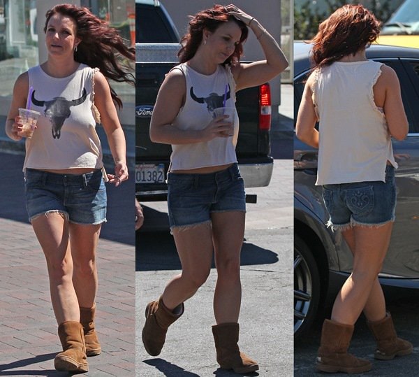 Britney Spears styled her UGG boots with cutoff denim shorts and a Texas Longhorns tank top for a relaxed look while shopping in Malibu on March 10, 2014