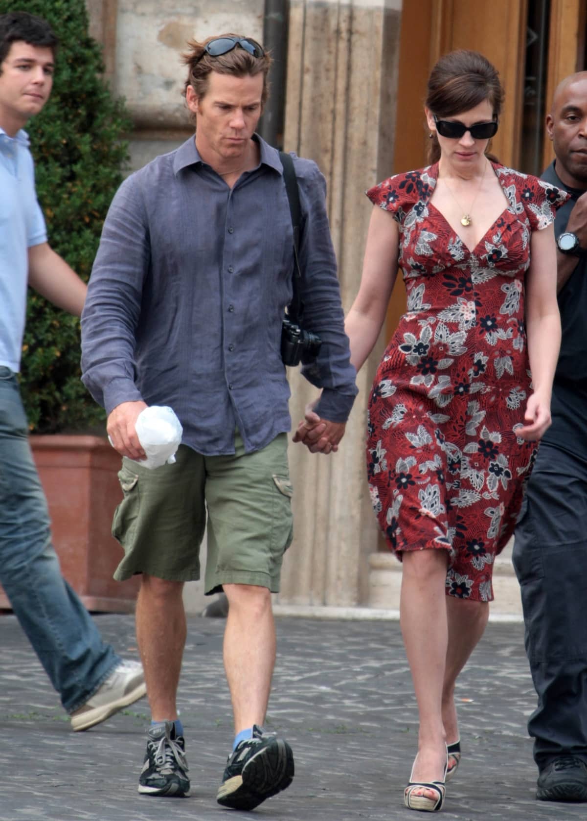 Julia Roberts and husband Daniel Moder stroll hand-in-hand in Rome, with the actress keeping it relaxed in a floral dress and open-toe espadrille wedges