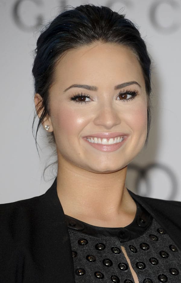 Demi Lovato looks radiant with her flawless makeup and sleek hairstyle at The Hollywood Reporter's Women in Entertainment Breakfast