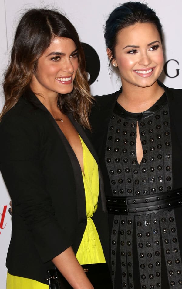 Nikki Reed with soft waves and Demi Lovato with a sleek blue updo showcase their distinct styles at The Hollywood Reporter's Women in Entertainment Breakfast