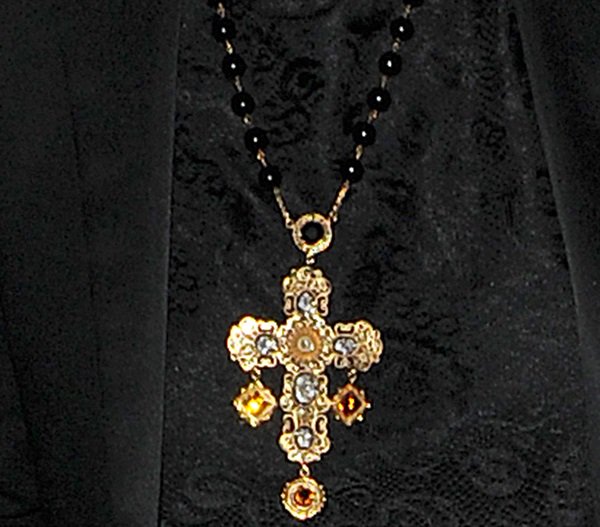 Rita Ora wearing a Dolce Gabbana 'Sicilian' filigree rosary necklace
