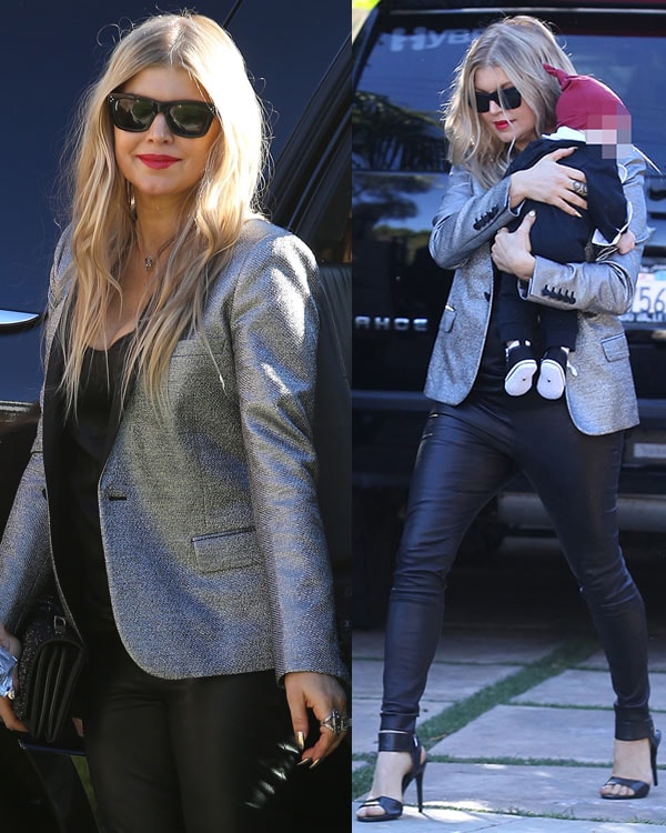 Fergie wears a silver tuxedo jacket and leather pants