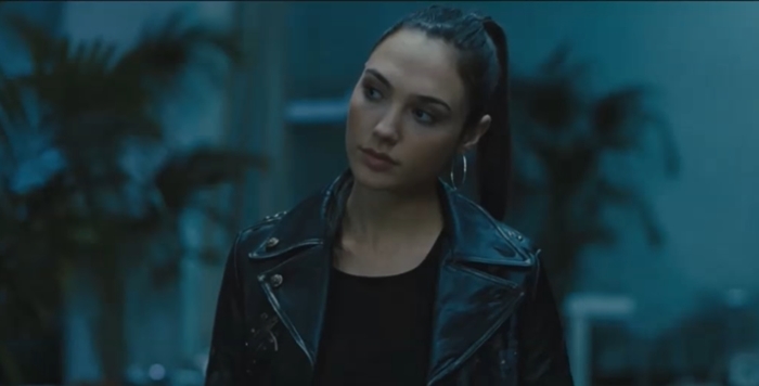 Gal Gadot as Gisele Yashar in Fast Furious, showcasing her tough yet stylish persona in a black leather jacket
