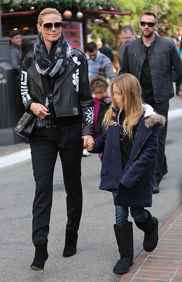 Heidi Klum exudes rock-chic elegance at The Grove, pairing her hand-painted Elizabeth and James leather jacket with sleek stiletto boots that elongate her frame and add an edgy, polished finish to her monochrome ensemble
