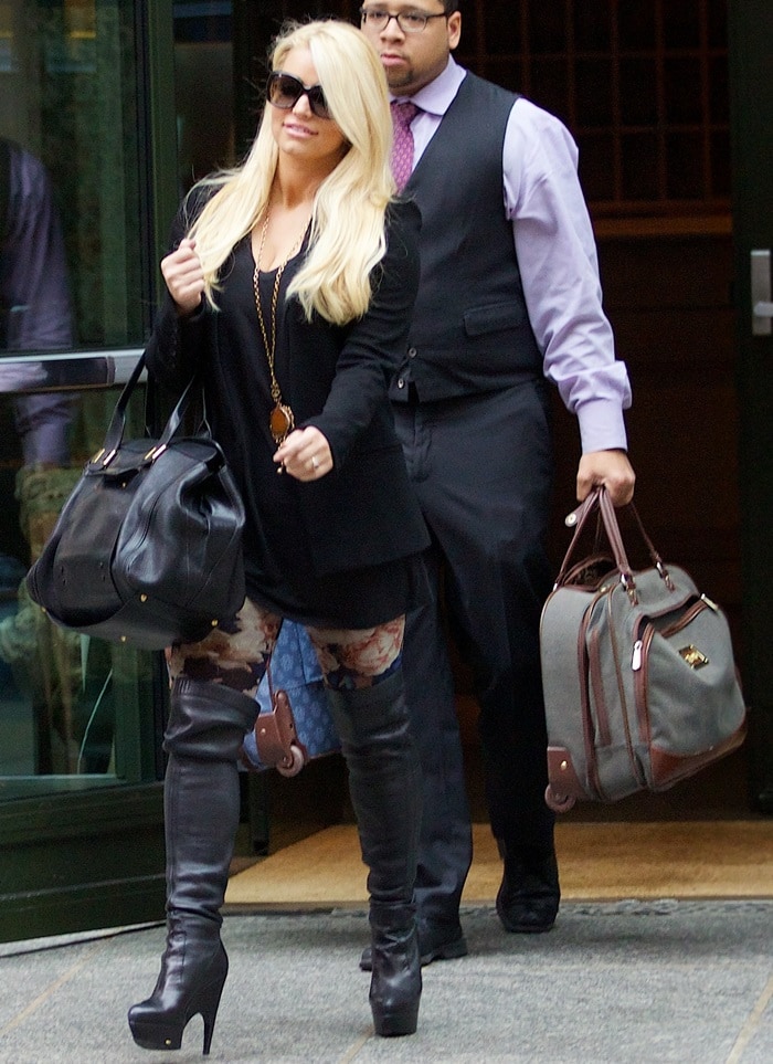 Jessica Simpson was spotted in New York City on December 5, 2013, wearing Yves Saint Laurent Imperiale leather thigh-high boots, a Chloe Alice satchel bag, and Jean Paul Gaultier Fuzzi Rose print leggings