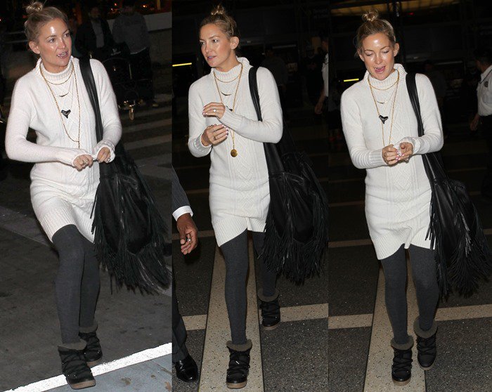 Kate Hudson was spotted at LAX on December 17, 2013, wearing an Ann Taylor sweater dress and Isabel Marant Nowles boots