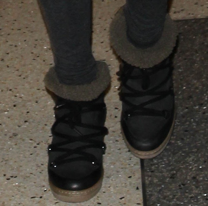 Kate Hudson completes her chic airport look with Isabel Marant 'Nowles' boots