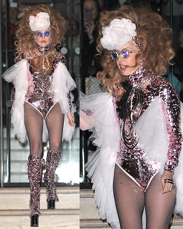 Lady Gaga wears a sparkling sequined leotard and a huge curled wig in chestnut