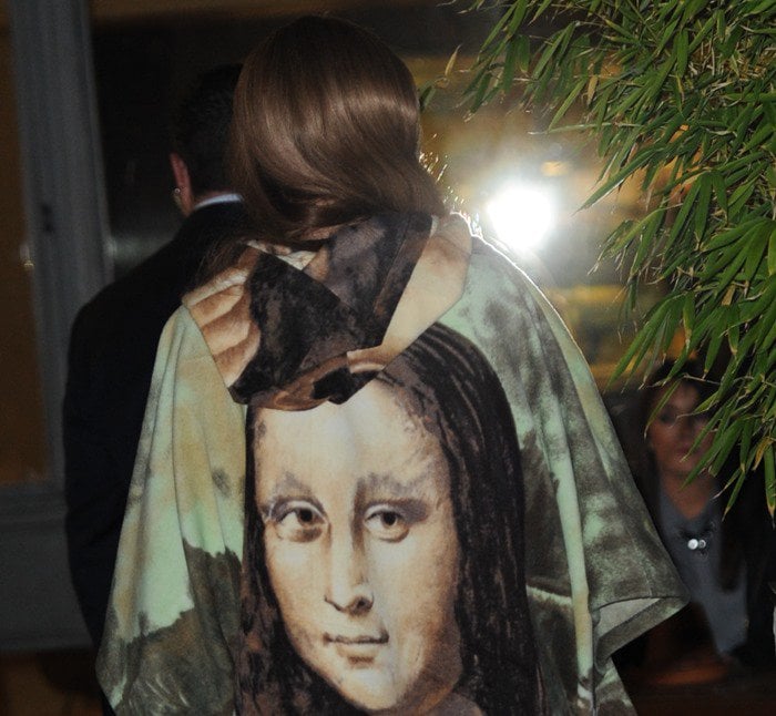 Lady Gaga showcases her unique fashion sense, stepping out in a striking Mona Lisa poncho dress