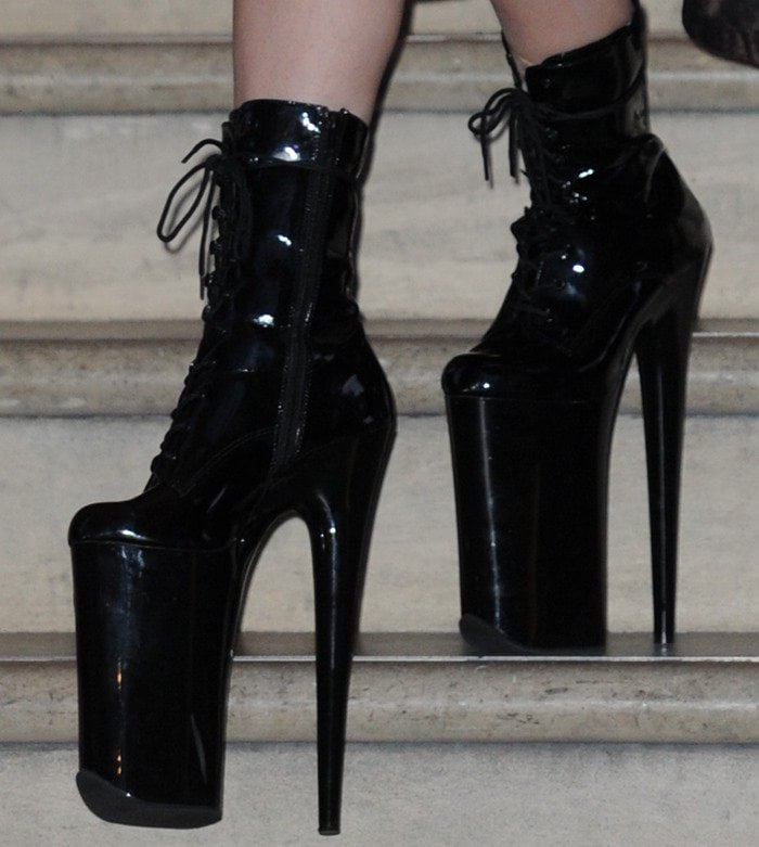 Lady Gaga completes her avant-garde outfit with a pair of towering black platform boots