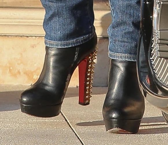 Lisa Vanderpump wearing Christian Louboutin Taclou Spiked-Heel Booties
