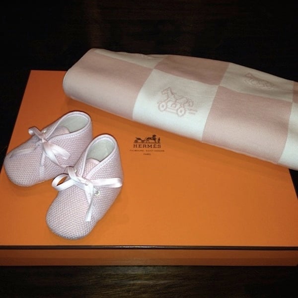 North West's adorable new Hermes baby booties and matching blanket, showcasing her early start in luxury fashion