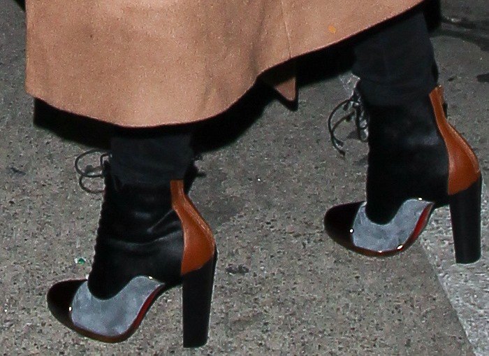 Christian Louboutin “Pate A Chou” ankle boots feature a striking patchwork of gray suede, black leather, and rich brown panels, contrasted by glossy burgundy cap toes and set on sturdy high block heels, with lace-up fronts adding a utilitarian, fashion-forward edge