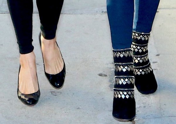 Paris Hilton kept it classic in sleek black patent Louboutin pumps, while Nicky Hilton added edge with bold Alaïa ankle boots detailed in silver studs and cutouts