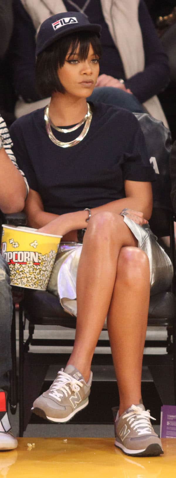 Rihanna knows how to dress for a basketball game