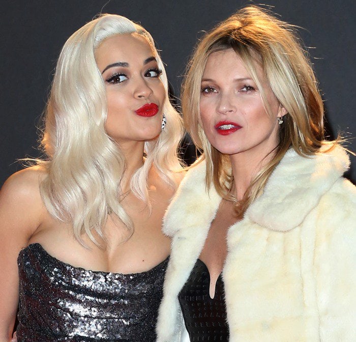 Rita Ora poses alongside Kate Moss, contrasting her glittering strapless dress with Moss’s plush ivory coat in a snapshot that captures the evening’s mix of modern glamour and fashion-industry royalty