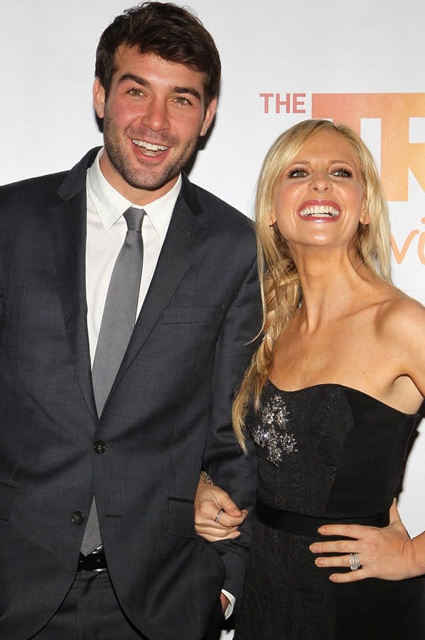James Wolk towers over Sarah Michelle Gellar at TrevorLIVE LA, honoring Jane Lynch and Toyota for the Trevor Project at the Hollywood Palladium on December 8, 2013