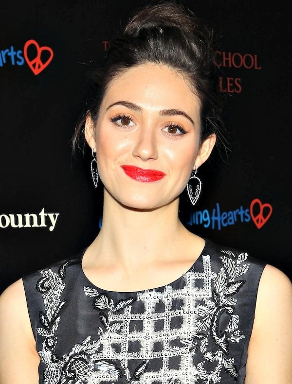 Emmy Rossum's hair was styled in a chic bun