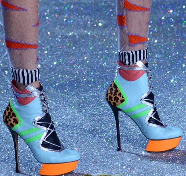 Jessica Hart walking in Nicholas Kirkwood booties