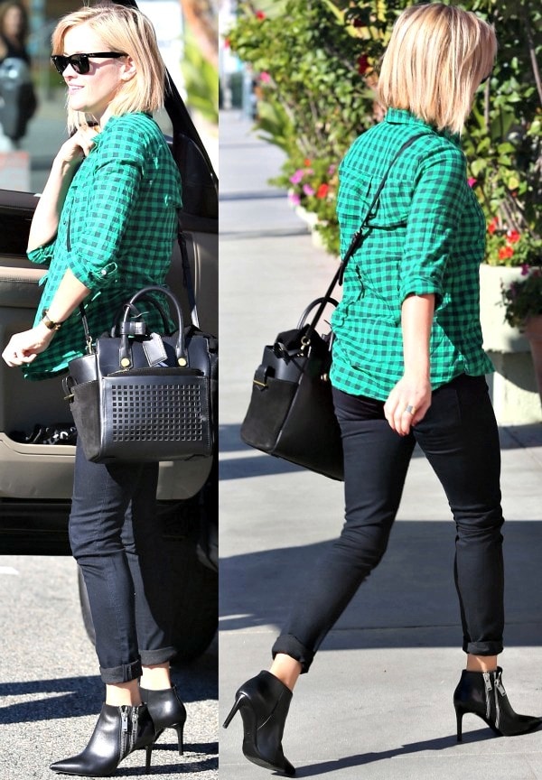 Reese Witherspoon was spotted arriving at Ivy at the Shore in Santa Monica on November 30, 2013, wearing a green plaid shirt paired with dark skinny jeans, black leather Saint Laurent ankle booties, and a structured black handbag