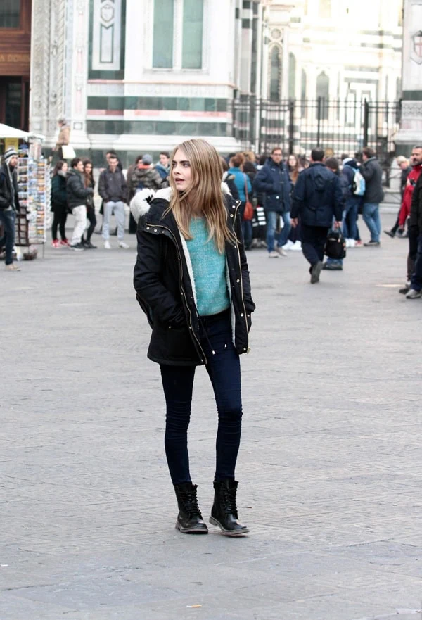 Cara Delevingne was seen filming "The Face of an Angel" in Florence on December 18, 2013, wearing a Topshop fur-trim-lined short parka