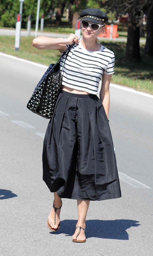 At the 70th Venice Film Festival, Diane Kruger stuns in a black full skirt, teamed with a striped shirt for a maritime flair