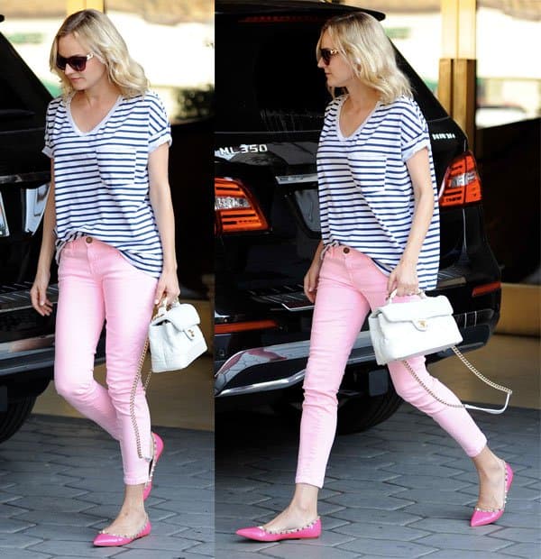Diane Kruger wearing pink skinny jeans while running errands in West Hollywood on January 11, 2014