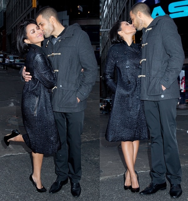 Kat Graham showed off the sharply pointed silhouette of her black Casadei “Blade” pumps during playful street-style moments with fiancé Cottrell Guidry outside NASDAQ MarketSite in Manhattan