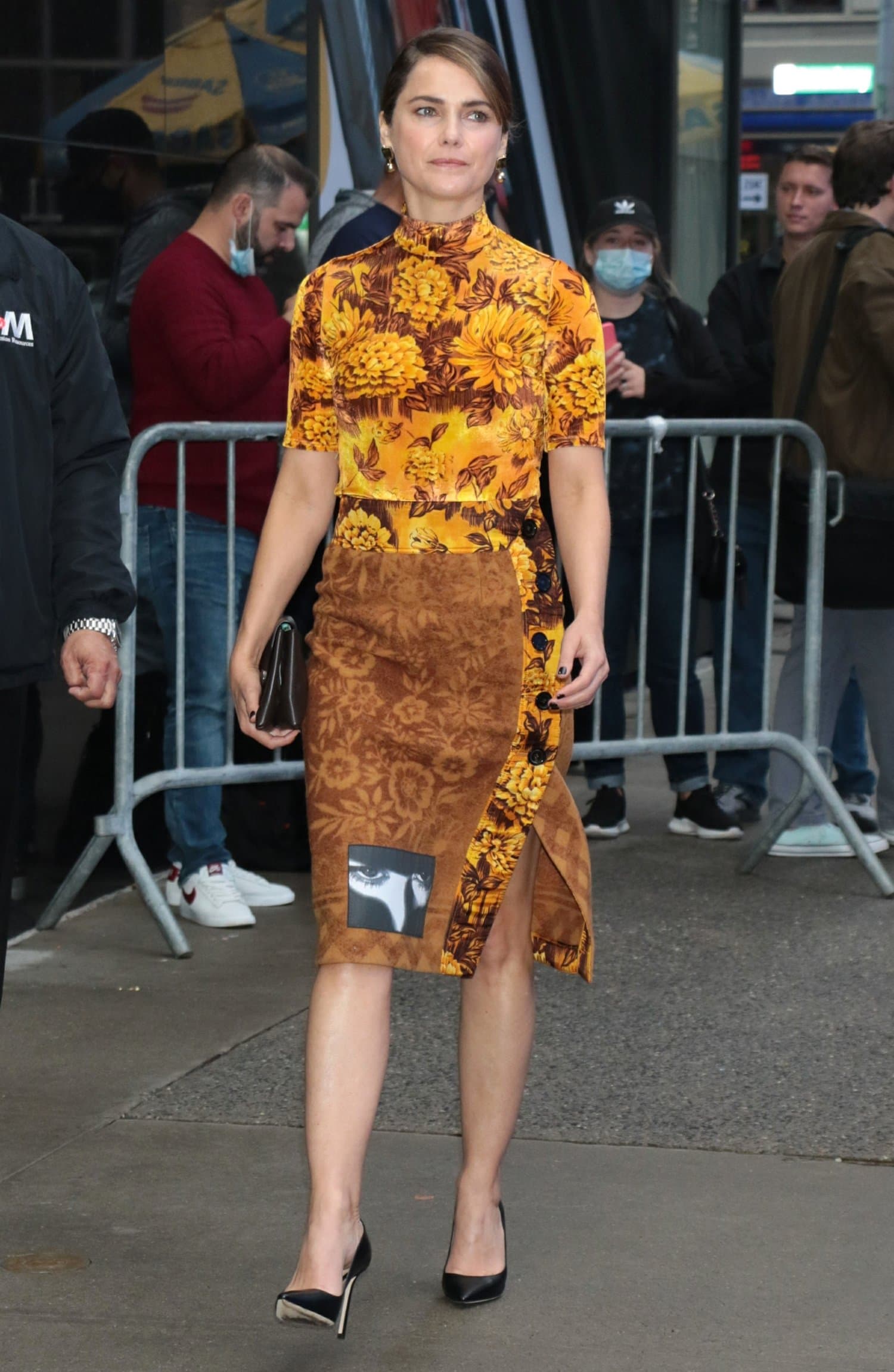 Keri Russell steps out in a golden Kwaidan Editions floral dress and black pumps for an appearance on Good Morning America