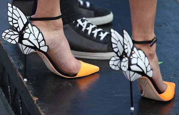 Nina Dobrev's striking Sophia Webster butterfly pumps, featuring orange-and-white design with delicate butterfly wings