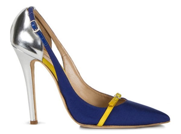 Shown in detail, the Oscar de la Renta “Kenzie” pumps combine blue grosgrain, yellow suede straps, and a polished silver heel for a standout finish